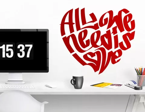Wandtattoo „All we need is love” in Herzform Wandtattoo „All we need is love” in Herzform