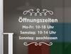 Öffnungszeiten-Aufkleber Schnörkel